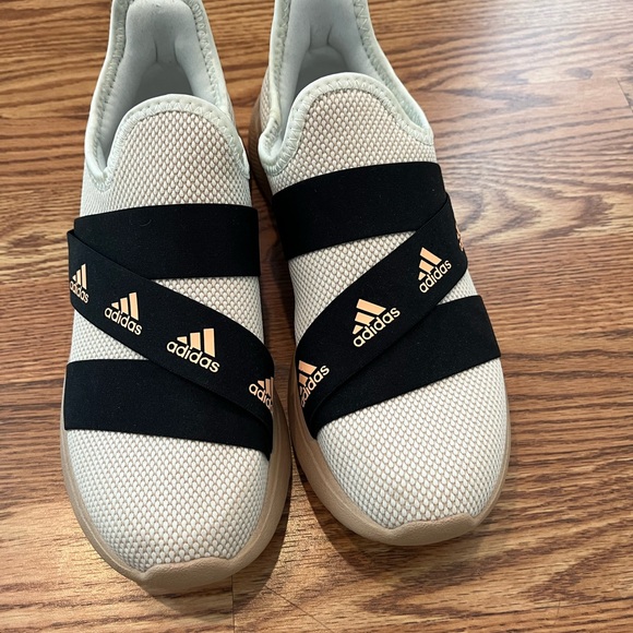 adidas Shoes - Adidas Beige Slip-On Sneakers with Black and Gold Accents